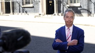Former leader of the Brexit Party Nigel Farage reports from outside Downing Street in London, Britain, July 7, 2022.