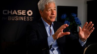Jamie Dimon, Chairman of the Board and Chief Executive Officer of JPMorgan Chase & Co., gestures as he speaks during an interview with Reuters in Miami, Florida, U.S., February 8, 2023.