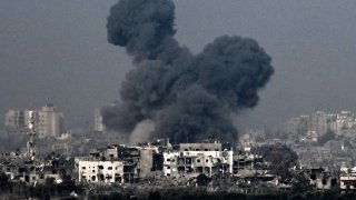 A picture taken from near the southern Israeli city of Sderot on October 28, 2023, shows smoke raising during an Israeli air strike in the northern Gaza Strip.