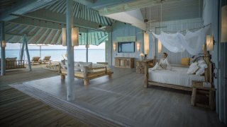 An overwater villa at Soneva Secret, opening in 2024.
