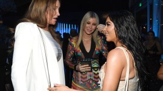 FILE - (L-R) Caitlyn Jenner and Kim Kardashian West attend the 2020 Vanity Fair Oscar Party hosted by Radhika Jones