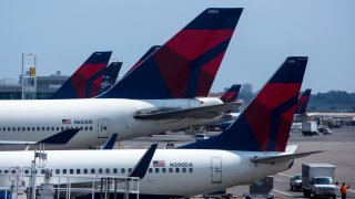 Delta Airlines planes sit at Terminal 4 at John F. Kennedy Airport in New York City.