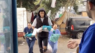 A screen grab captured from a video shows premature babies under treatment in the neonatal intensive care unit removed from the incubators and transferred to another department in the hospital after Israeli attack on Shifa Hospital in Gaza City, Gaza on November 14, 2023.