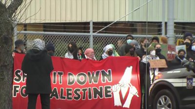 Protesters gather outside Colt Manufacturing in West Hartford