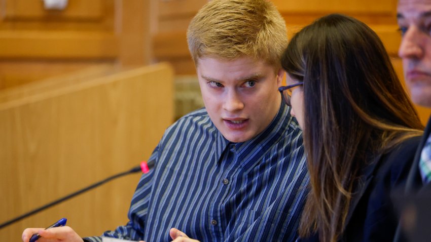 Jeremy Goodale talks with his defense co-counsel Nicole Jensen