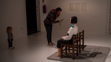 A visitor takes photos to the statue of A Girl of Peace, by Kim Eun-Sung & Kim Seo-Kyung at Barcelona's Museum of Forbidden Art in Barcelona, Spain, Wednesday, Nov. 8, 2023.