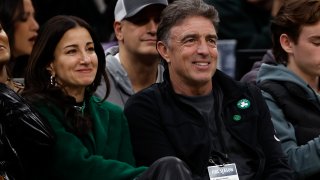 This Dec. 27, 2022, file photo shows Boston Celtics majority owner Wyc Grousbeck and his wife Emilia Fazzalari at the Celtics game against the Houston Rockets at TD Garden.