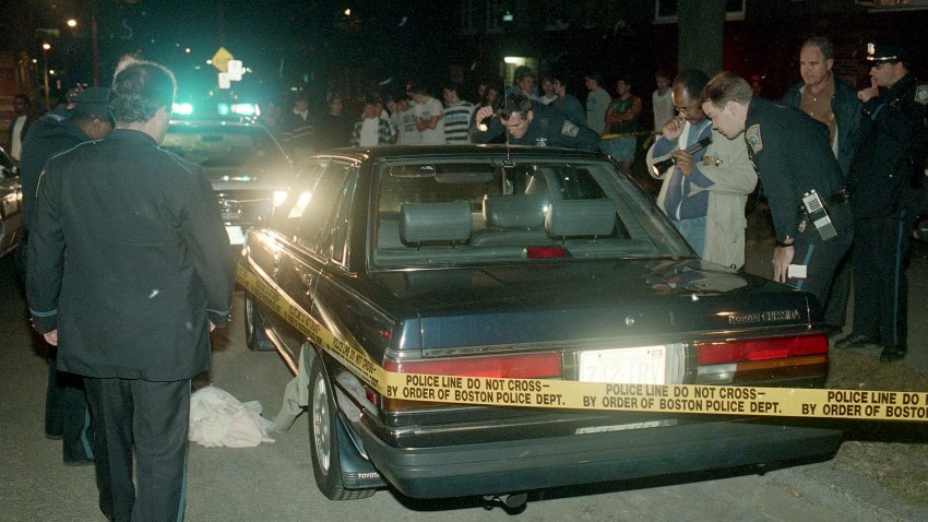 October 23, 1989: Police investigate Charles Stuart's car on St. Alphonsus St. in Mission Hill after the murder of Carol Stuart.