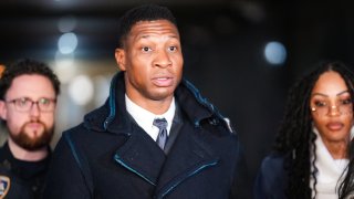 Actor Jonathan Majors leaves the courthouse following closing arguments in Majors' domestic violence trial at Manhattan Criminal Court on December 15, 2023 in New York City. Majors had plead not guilty but faces up to a year in jail if convicted on misdemeanor charges of assault and harassment of an ex-girlfriend. (Photo by John Nacion/Getty Images)