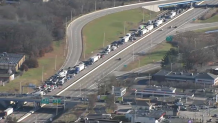 Traffic backed up on I-195 near the Washington Bridge in Providence, Rhode Island, on Tuesday, Dec. 12, 2023.