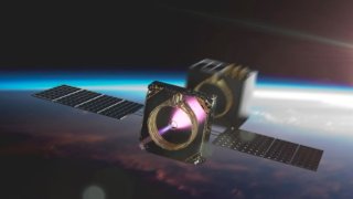 An artist’s rendering of a Momentus Vigoride transfer vehicle deploying a satellite in orbit.