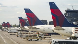 Delta Air Lines airplanes are seen parked at Hartsfield-Jackson International Airport in Atlanta.