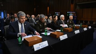 (L-R) FBI Director Christopher Wray, National Security Agency Director General Paul Nakasone, Director of National Intelligence Avril Haines, CIA Director William Burns and Defense Intelligence Agency Director Lieutenant General Scott Berrier, prepare to testify before a Senate Intelligence Committee hearing on worldwide threats, in Washington, DC, on March 8, 2023.