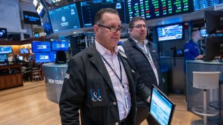Traders work on the floor of the New York Stock Exchange (NYSE) on November 15, 2023 in New York City.