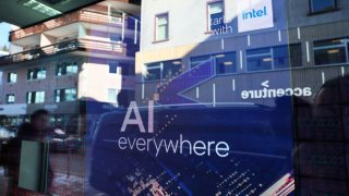 A slogan related to Artificial Intelligence (AI) is displayed on a screen in Intel pavilion, during the 54th annual meeting of the World Economic Forum in Davos, Switzerland, January 16, 2024. 