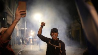 A supporter of Guatemalan President-elect Bernardo Arévalo