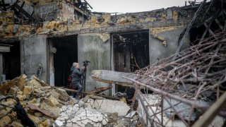 Journalists film the destroyed sewing factory in the port city of Odessa after a night-time drone attack. Three people were killed in the attack. February 24, 2024 marks the second anniversary of the start of Russia’s war of aggression against Ukraine.