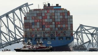 The cargo ship Dali sits in the water after running into and collapsing the Francis Scott Key Bridge on March 26, 2024 in Baltimore, Maryland. 