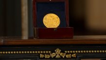 A medal is displayed during a ceremony to honor members of the Ghost Army, a secretive WWII-era unit, with the Congressional Gold Medal during a ceremony on Capitol Hill, Thursday, March 21, 2024, in Washington. (AP Photo/Mark Schiefelbein)