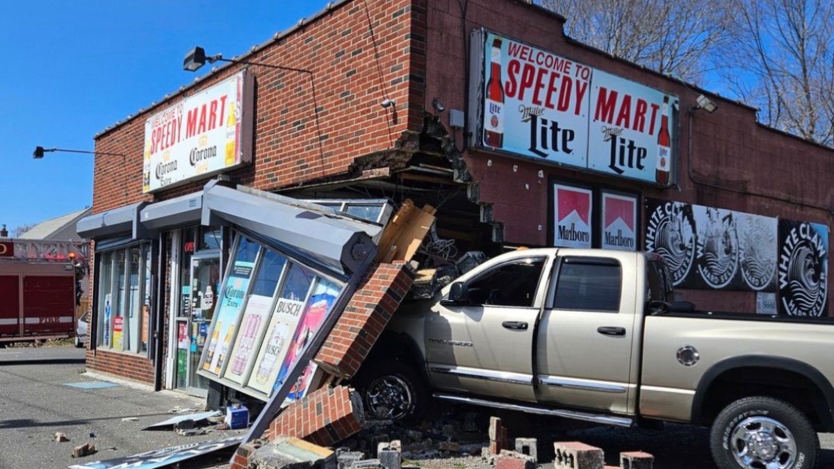 Pickup truck causes significant damage after crashing into building in ...