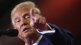 Republican presidential candidate former President Donald Trump speaks to guests during a rally at Clinton Middle School on January 06, 2024 in Clinton, Iowa.
