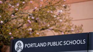 The Portland Public Schools district office is seen on Friday, April 5, 2024, in Portland, Ore. A young girl and her guardian have sued an Oregon nonprofit organization, Portland Public Schools and Multnomah County for $9 million, alleging they were negligent when male classmates sexually abused her