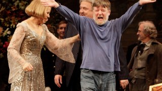 FILE – Conductor Andrew Davis, right, raises his arms as he takes a bow, accompanied by Renee Fleming, and Peter Rose, center, during the final dress rehearsal of Richard Strauss’s “Capriccio” in the Metropolitan Opera at New York’s Lincoln Center, March 25, 2011. Davis, the acclaimed British conductor who was music director of the Lyric Opera of Chicago and orchestras on three continents, has died, Saturday, April 20, 2024. He was 80.