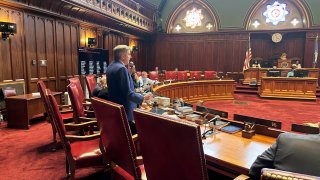 Democratic state Sen. James Maroney of Connecticut explains a far-reaching bill that attempts to regulate artificial intelligence during a debate in the state Senate in Hartford, Conn. on Wednesday, April 24, 2024. The bill marks one of the first major legislative proposals in the country to reign in bias in AI decision-making and protect people from harm.