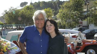 FILE - Jay Leno and Mavis Leno attend the private unveiling of the Meyers Manx electric automobile at Little Beach House Malibu
