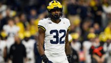 INDIANAPOLIS, IN - DECEMBER 02: Michigan Wolverines edge Jaylen Harrell (32) looks to the sidelines during the Big 10 Championship game between the Michigan Wolverines and Iowa Hawkeyes on December 2, 2023, at Lucas Oil Stadium in Indianapolis, IN. (Photo by Zach Bolinger/Icon Sportswire via Getty Images)