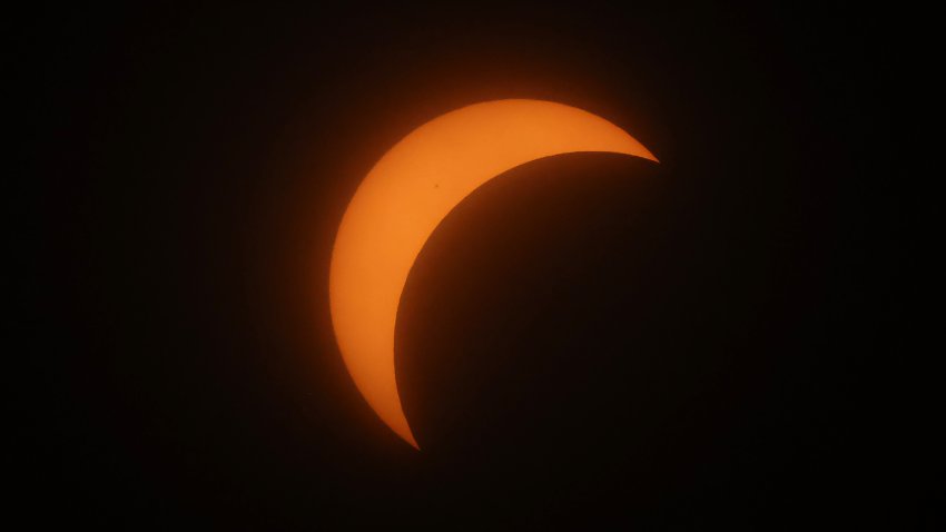 NEW YORK, NEW YORK – APRIL 08: A partial solar eclipse is seen from the Top of the Rock at Rockefeller Center on April 08, 2024 in New York City. While New York City isn’t in the path of totality, it will see up to 90% of the sun covered by the moon. Around New York and in the path of totality, millions of residents and tourists are preparing for a total solar eclipse. This is the first solar eclipse to pass through North America in seven years and will be the last that will be visible from the United States until 2044. (Photo by Michael M. Santiago/Getty Images)