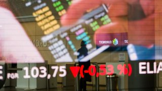 Stock price information reflected on a window at the Euronext NV stock exchange in Paris, France, on Monday, March 13, 2023. 