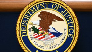 The seal of the US Department of Justice in Washington, DC on March 21, 2024. 