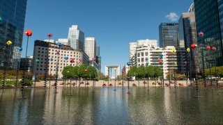 Office buildings around the fountain in the La Defense business district in Paris, France, on Tuesday, April 23, 2024.