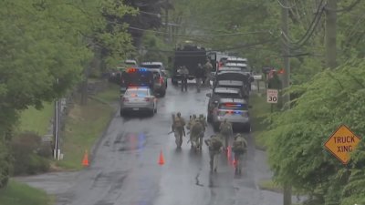 2 suspects charged with burglary after Woodstock standoff