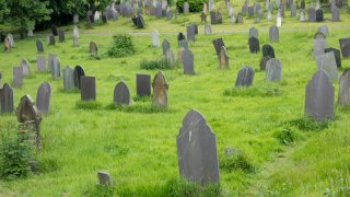FILE: A graveyard with gravestones.
