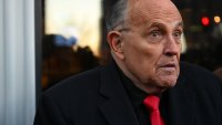 Rudy Giuliani is served indictment papers at his own birthday party after mocking Arizona attorney general