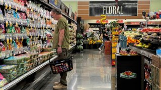 A customer shops at a Safeway store on June 11, 2024 in Mill Valley, California. 