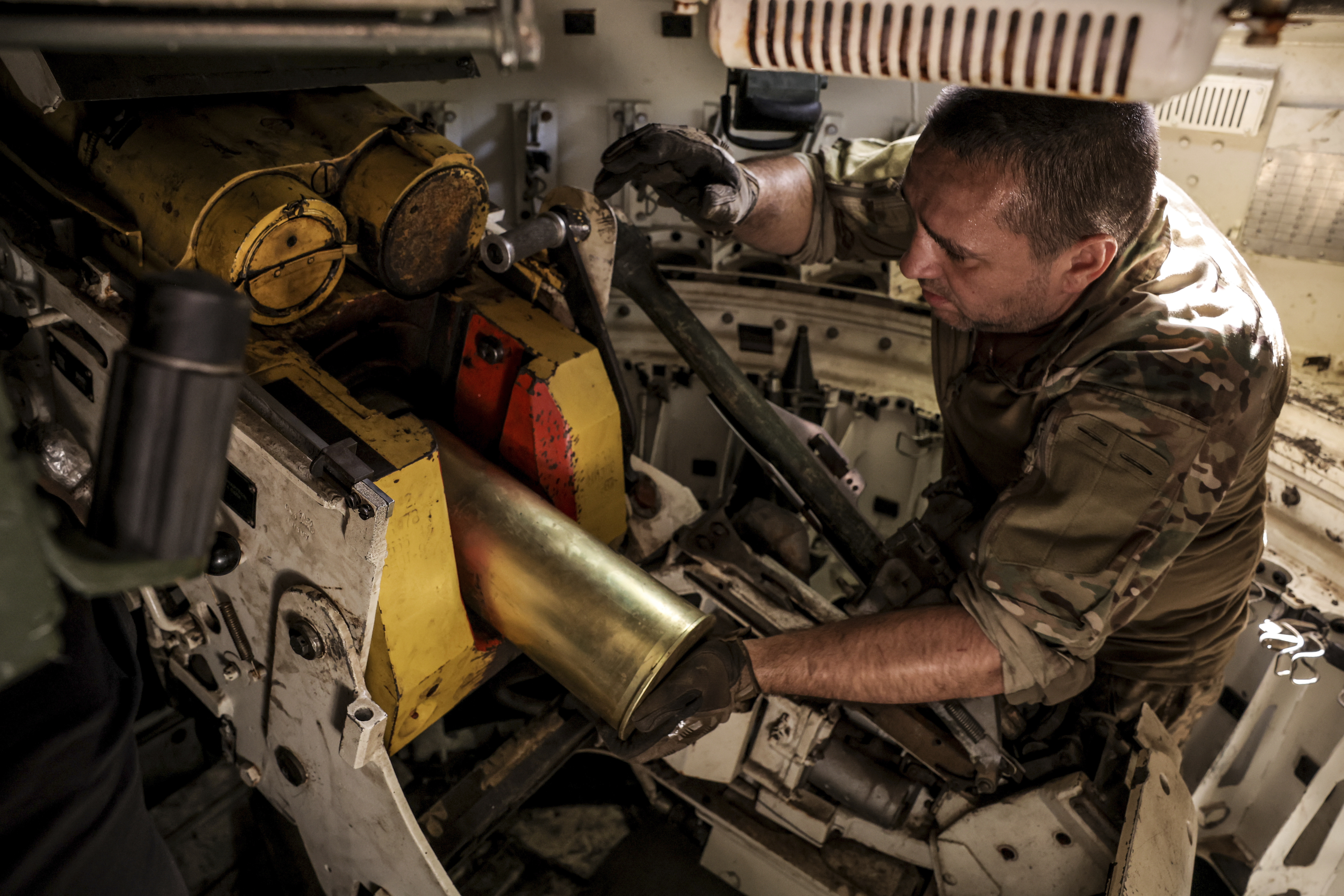 serviceman prepares to fire a "Gvozdika"