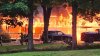 Crews battle large fire at Plainfield home