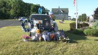 Memorial grows for fallen state trooper in Southington, Conn.