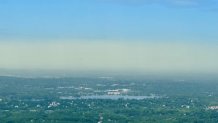 A layer of yellow haze from pollen over Boston on Monday, June 3, 2024.