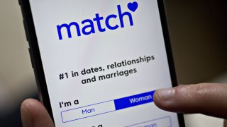 The Match dating application is displayed on an Apple iPhone.