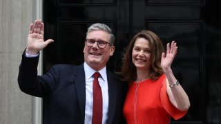 Britain’s incoming Prime Minister Keir Starmer and leader of the Labour Party, and his wife Victoria pose on the steps of 10 Downing Street in London on July 5, 2024.