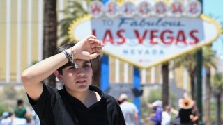 A man walks near the Las Vegas strip during a heatwave in Las Vegas on July 7.