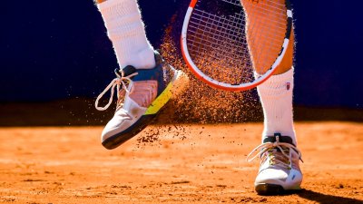 How are tennis shoes different for clay courts?