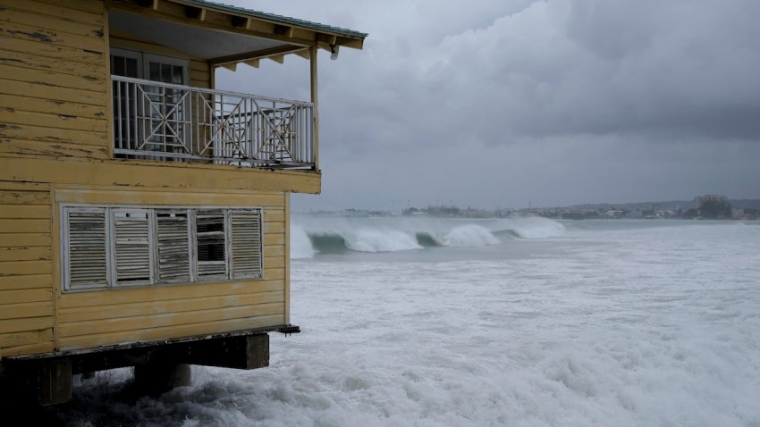 Waves batter a pier during the pass of Hurricane Beryl in Bridgetown, Barbados, July 1, 2024.