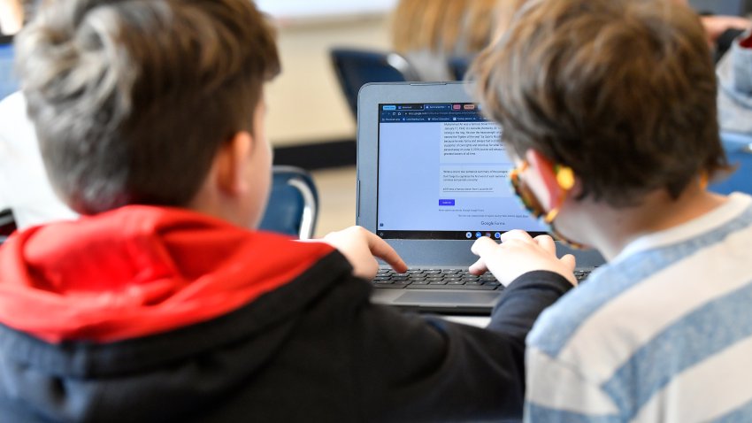 Students work on a laptop computer at Stonewall Elementary in Lexington, Ky.