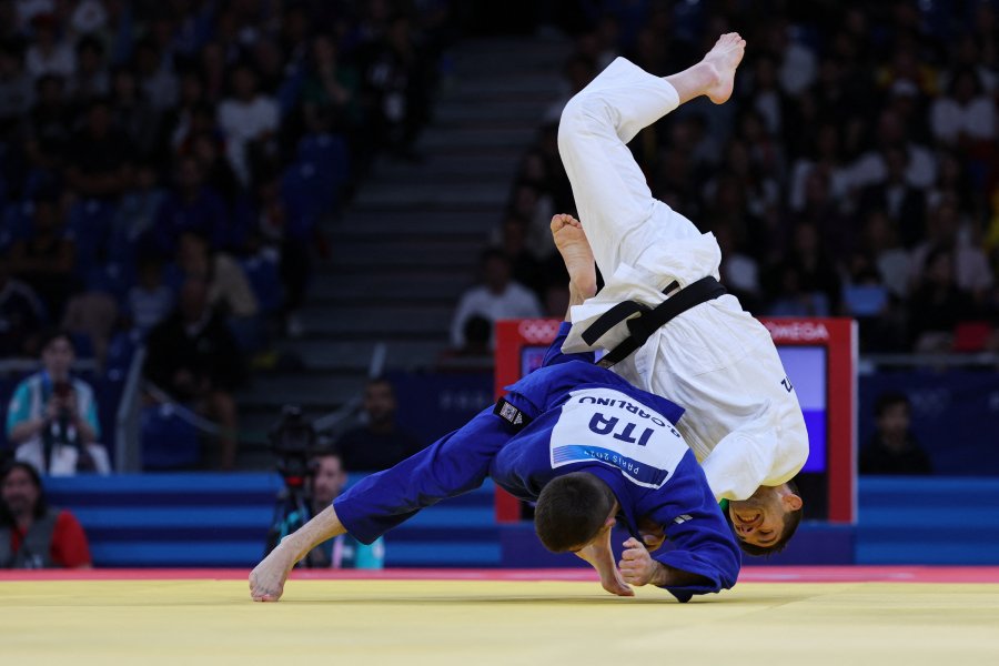 Joshua Katz and Andrea Carlino compete in the judo