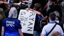 NANTERRE, FRANCE - JULY 29: Ryan Murphy of United States celebrates his bronze medal with his family after a "gender reveal" during the Men's 100m Backstroke Medals ceremony on day three of the Olympic Games Paris 2024 at Paris La Defense Arena on July 29, 2024 in Nanterre, France. (Photo by Jari Pestelacci/Eurasia Sport Images/Getty Images)